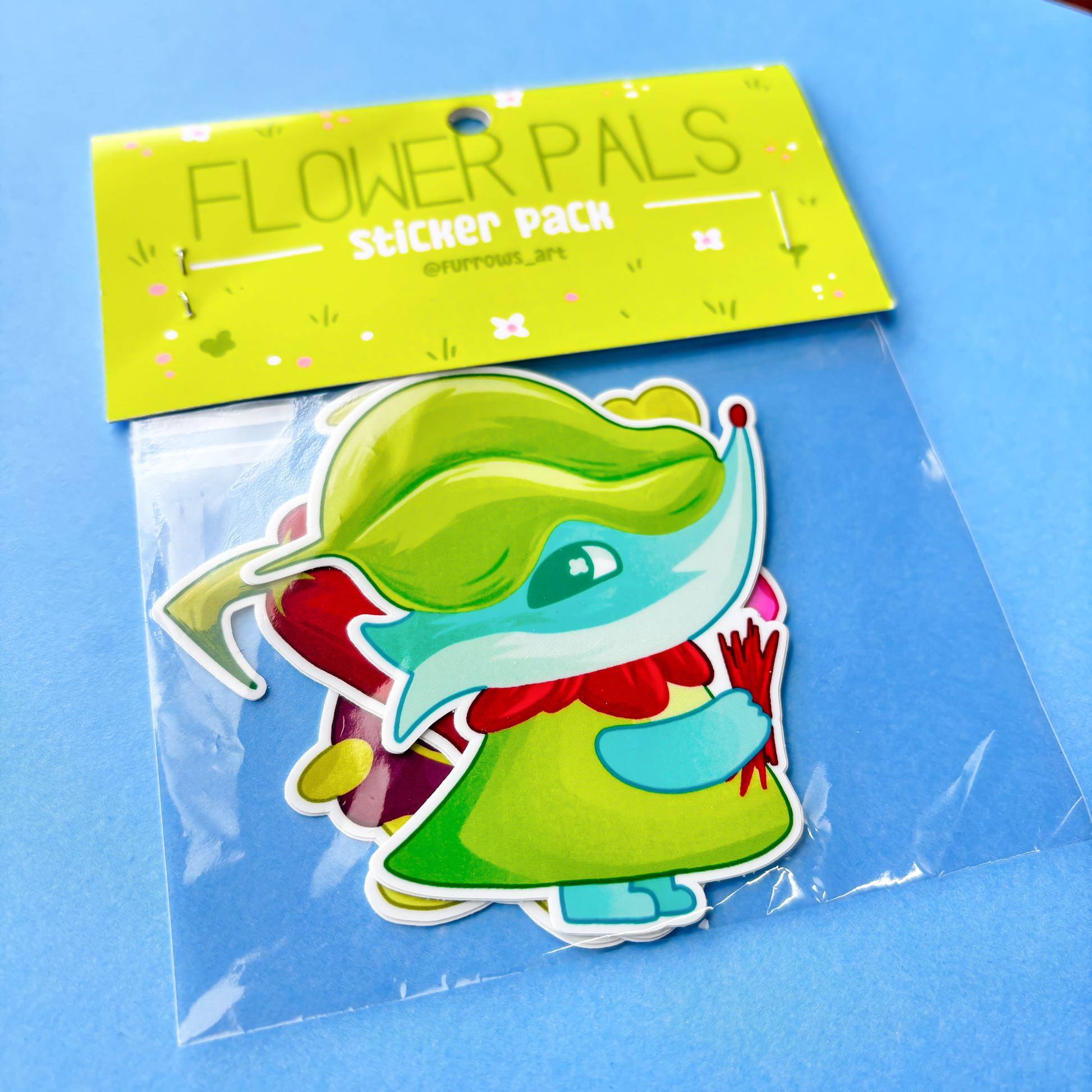Flower Pals sticker pack with a green character on a blue background